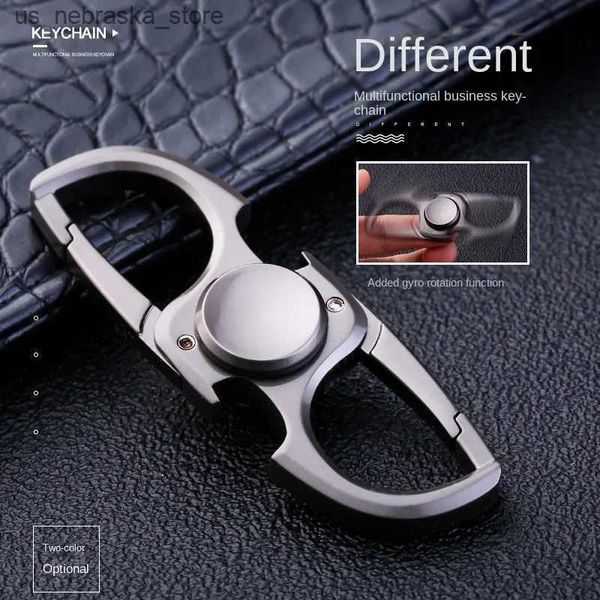 Jeux de nouveauté Fidget Toy Mens Creative Design Gift Fidget Rotating Keychain en acier inoxydable Clé Rague Créative Pression Créative Toy Q240418