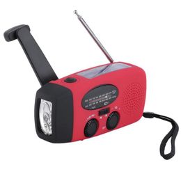 Artículos novedosos 3 en 1 Cargador de emergencia Generador de manivela Eólico / Solar / Dinamo Powered Fm / Am Radio Teléfonos Cargadores Linterna LED Q03 Dh17X