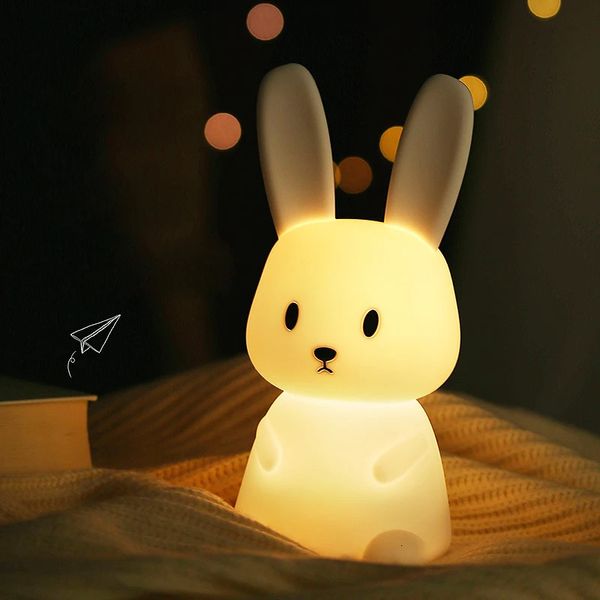 Artículos de novedad LED Conejo Luz de noche Lámpara de dormitorio Sensor táctil Silicona Animal Luces recargables Linterna Lindo regalo para niños Niños 231017