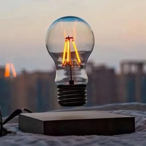 Articles de nouveauté Lampe à lévitation magnétique Créativité Ampoule LED en verre flottant Décoration de bureau à domicile Cadeau d'anniversaire Table Veilleuse 231017