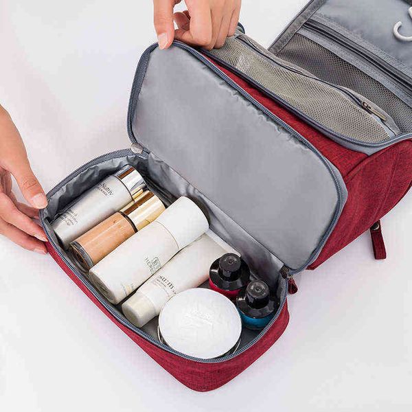 Nxy Bolsas de cosméticos Maquillaje Almacenamiento de viaje Gran capacidad Impermeable A prueba de moho Separación en seco y húmedo Lavado 220302