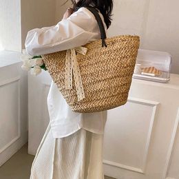 Nxy Summer Women Weave Straw Tote designer clutch Bag Nouveau dans les sacs de plage de voyage Handmade Lady Rotin Bucket Shoulder Side Sacs à main 230424