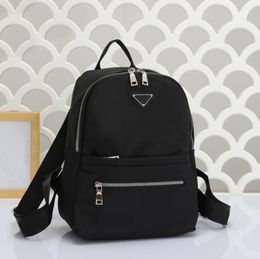 Mochila de nailon, bolsos de hombro, mochila negra clásica Unisex, letrero triangular, cremallera metálica, bolsillos de alta calidad, mochila escolar