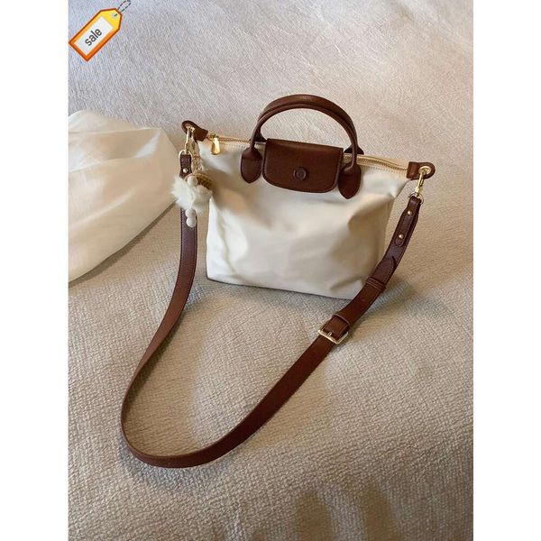 Bolso de lona de nailon para mujer 2023 Nueva moda Fábrica de Corea del Sur Tote al por mayor Versátil Bolsas de compras de gran capacidad Moda Bolso Longchammp