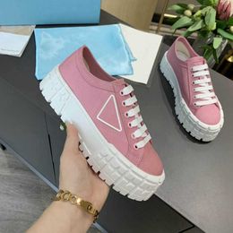 Nylon lage schoenen schoenen met dubbele wielen voor dames dikke getextureerde zool zwart wit platform sneaker casual reisfeest