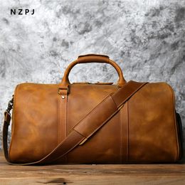 NZPJ Mens Retro Leather Bag First Capeta Vacada Bolsa de viaje Bag de viaje de negocios Bag de hombro 240423