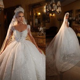 Robes de mariée à paillettes O REQUELL