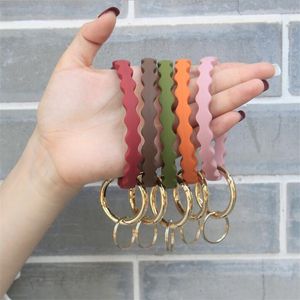 O Gel de silice porter Bracelet porte-clés pour filles bijoux cadeaux à la mode Simple vague Style cercle bracelet porte-clés Bracelet unisexe