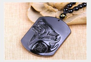 Collier de tête de loup d'obsidien Pendant des totems de loup en pierre sculptée