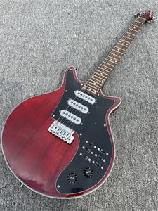 Uit de kast, gesigneerd door Brian May, bijzondere vintage kersenrode 6-snarige elektrische gitaar, pick-up truck en zwarte schakelaar