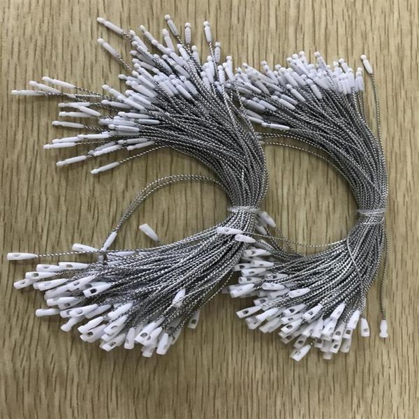 Stock de bureau Bonne qualité tête de balle blanche étiquette volante chaîne dans les vêtements vêtements joint de vêtement Plug Loop Lock Cord Fastener 100304z