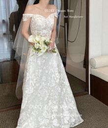 OLOEY Exquisite volledige kant Korea trouwjurken Cap Mouwen vloer lengte bruidsjurken korset terug elegante fotoshoot mariage