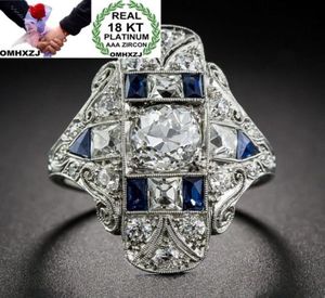 Omhxzj entièrement européen Fashion Femme Man Party Mariage Gift Rectangle Topaz Blue Zircon 18kt Ring Gold White RR6206638014