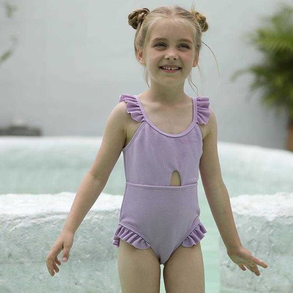 One Piece Color sólido Niños One Piece Swimsuit Lace Sling Girls Swimwear al por mayor