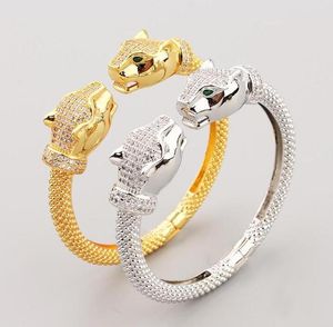 Bracelet ouvert avec bracelet léopard à double tête incrusté de zircon cuivre plaqué or pour hommes et femmes bijoux Hiphop Rock Punk
