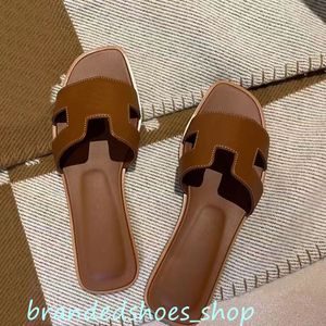 Oran Designer pantoffels klassieke platte hak zomer lui mode cartoon grote kop Rubberen slippers leren pantoffels damesschoenen sexy sandalen groot