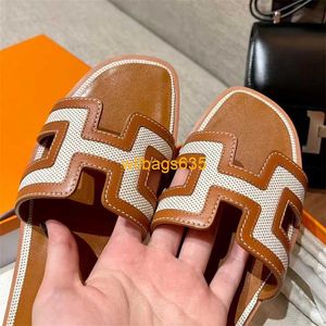 Oran Sandals Summer Smlippers Sole en cuir authentique avec une sandale en ligne droite pour les femmes 2024 Springsummer New Tourism Vacation Colo a HB101J