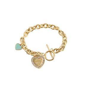 Marque originale version en acier titane or 18 carats TFF classique bleu goutte d'huile imprimé plein diamant amour OT boucle bracelet pour les femmes