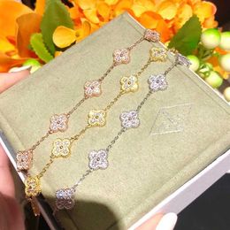Origineel door ontwerper van vier bladgras Zes bloemarmband ingelegd met volle diamant dik vergulde v goud 18k licht luxe klassieke sieraden