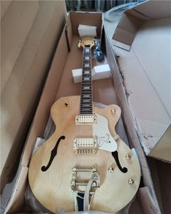 Guitare électrique originale avec pickguard blanc, touche en palissandre, accastillage doré, la guitare est en stock et peut être expédiée immédiatement