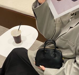 Handheld à main le cuir d'origine mini sac de coquille pour femmes Fashion Single Sac à corps crossbody bottes de sac à main