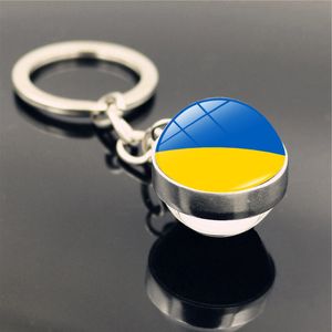 ZL0617 Porte-clés en métal drapeau ukrainien - Boule de verre souvenir de la coupe du monde - Priez pour l'Ukraine - Soutien à la paix