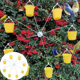 Otros suministros para pájaros Molino de viento en forma de alimentador Derrame de alimentos Juguete Colgante al aire libre Rueda de ferris con colibrí para jardín