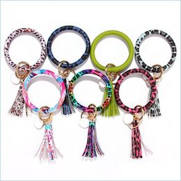 Andere armbanden 13 stijlen Women mode bedrukte armbanden sieraden polsbekel sleutelhanger bangle sleutelhanger grote cirkel lederen kwastje bracel dhnuk