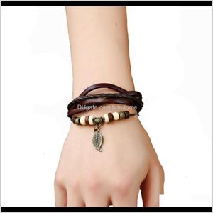 Autres bracelets Bijoux Drop Livraison 2021 Bracelet tissé en cuir avec pendentif, bouton pour femme, bracelet perlé décontracté, couples rétractables BR