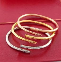 Andere armbanden luxe ontwerper titanium staal nagelbangle armband diamant schroef manchet dames mannen merk sieraden voor trouwfeest cadeaukwaliteit
