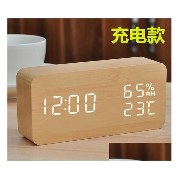 Autres horloges accessoires sonnette d'alarme créative électronique LED horloge en bois contrôle du son cadeau moyen Rectangar température et humidité Dhofl