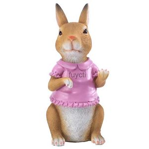 Autres fournitures de fête d'événement Figurine de lapin de Pâques portant un manteau rose Statue de résine de lapin miniature pour la décoration de bureau de fête de vacances à la maison beau cadeau YQ240116