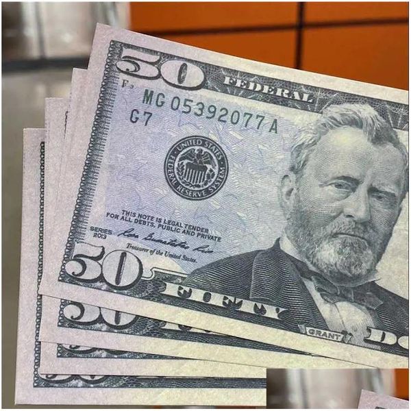 Otros suministros festivos para fiestas Ventas al por mayor Prop Money EE. UU. Dólares falsos para películas Papel de billetes Novedad Juguetes 1 5 10 20 50 100 dólares Dhpyq
