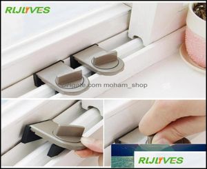 Otros artículos de ropa doméstica 1 PC Movimiento Ventana de seguridad Infantil Lock Sliding Windows Cerraduras para el gabinete de niños Tope de seguridad de la puerta Drop9001888