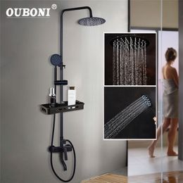 OUBONI noir mat salle de bain douche mitigeur robinet pluie douche robinets ensemble levier baignoire douche mitigeur robinet W / étagère de rangement LJ201212
