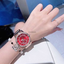 Oujias new fashionable rond watch watch watch with diamond incrust a niche mode womens watch