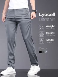 Oussyu merk lente zomer zacht stretch lyocell stoffen heren casual broek dunne slanke elastische taille zakelijke grijze broeken mannelijk 240415