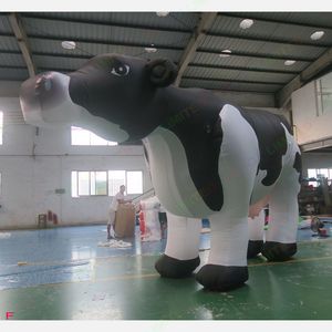 Vaca lechera holandesa inflable gigante personalizada para actividades al aire libre para publicidad