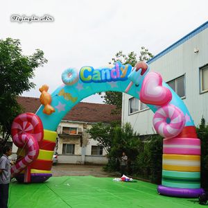 Arc de bonbons gonflable de publicité extérieure 8m de largeur arcade de noël soufflée à l'air coloré pour la décoration de porte d'entrée de magasin