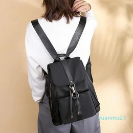 Sacs de plein air 2023 imperméable 24 sac à dos en tissu femme version coréenne du sac de toile de nylon de voyage sauvage solide