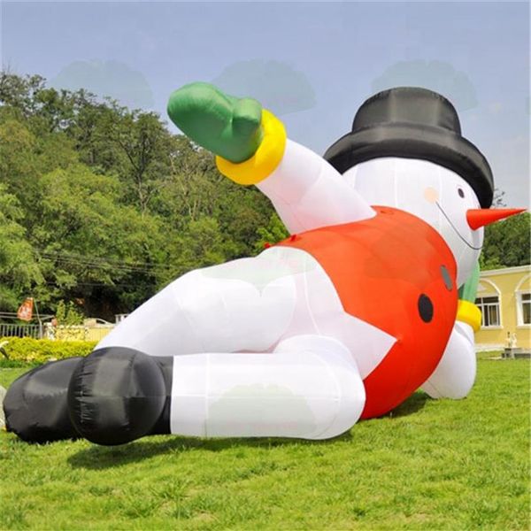 Jeux de plein air personnalisé décoration de Noël gonflable bonhomme de neige ballon air hiver caractère couché avec chapeau rouge pour USA254B