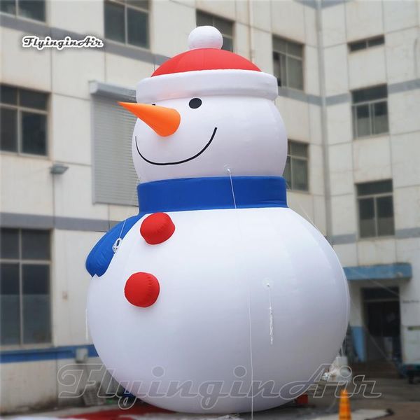 Balançoires de Noël géantes en plein air Bonhomme de neige gonflable 6 mH (20 pieds) avec ventilateur Figure de dessin animé mignon Ballon modèle de bonhomme de neige soufflé à l'air blanc pour la décoration d'hiver