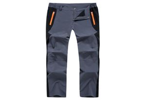 Buiten QuickDrying Pants Nieuwe Men039S Quickdrying Elastic Mountaineering Trousing broek Men039S Summer Mode Color Matching5244233