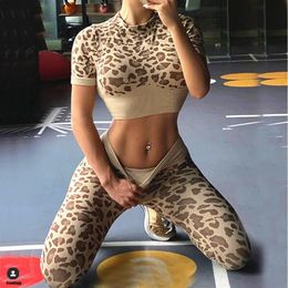 Atuendo 2023 Fashion Fashion Sexy Leopard impresos 2 PCS Set de yoga Gym Gym Shock Propons Sports Sport Leggings para hacer ejercicio Traje de entrenamiento