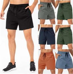 Outfit LL 2024 Designer Citrons Hommes Yoga Sports Court Séchage rapide LU Shorts avec poche arrière Téléphone portable Casual Running Gym Jogger Pant Joggers Men