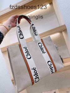 Outlet Single Tote Japanese 2024 Designer Woody Cloee Fashion Handsbag Hands Hands Hands Bags Sac Sac Niche Niche Design portable grande fourre-tout Crvy