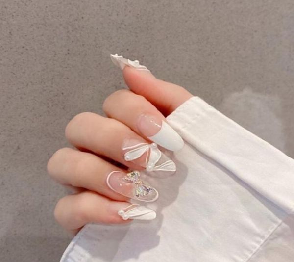 OVAL FRENSE FAKE Nails Long Press sur 3D Bow Tie False Fingernails avec designs Round Acrylique White Glue ON pour les femmes et les filles1541904