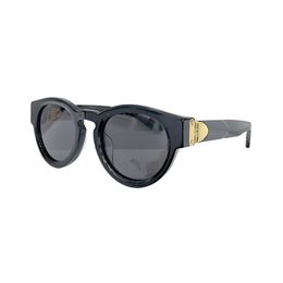 Lunettes de soleil à verres ovales pour femmes ou hommes unisexes à monture complète gravée lunettes de conduite en plein air lunettes de mode lunettes de soleil de créateur