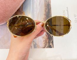 Gafas de sol ovaladas Marco de comida dorada con lente marrón para mujeres Gafas de sol diseñadores vasos tonos de verano sunnies lunettes de soleil uv400 gafas