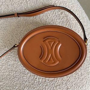 Portefeuille ovale d'été TRIOMPHES Sacs de vacances CrossBody Femmes les sacs à main fourre-tout épaule en cuir véritable Hobo même sac hommes luxes Designer vacances fronde pochette